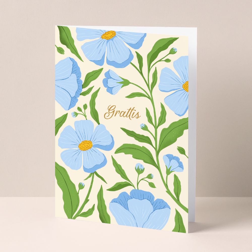 Grattiskort med blå blommor och guldtext