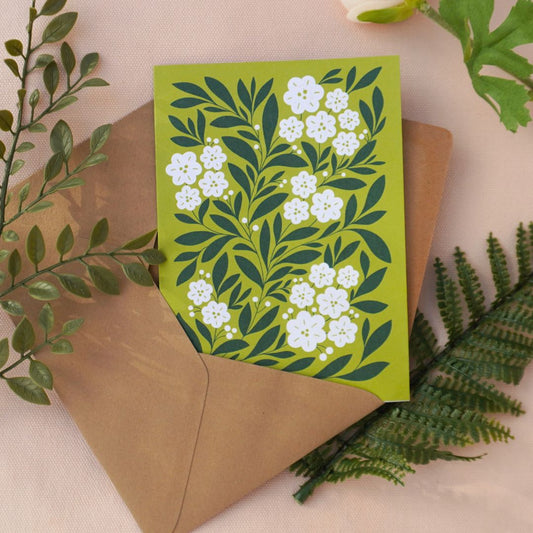 Grönska och vita blommor - minimalistiskt gratulationskort